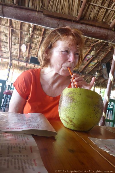 Mum drinking a coconut